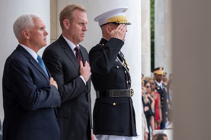 Vice President Mike Pence, Acting Defense Secretary Patrick M. Shanahan, and Chairman of the Joint Chiefs of Staff Marine Corps Gen. Joe Dunford, honor the fallen men and women of the U.S. military, at the 151st Memorial Day observance at Arlington National Cemetery, Va., May 27, 2019.