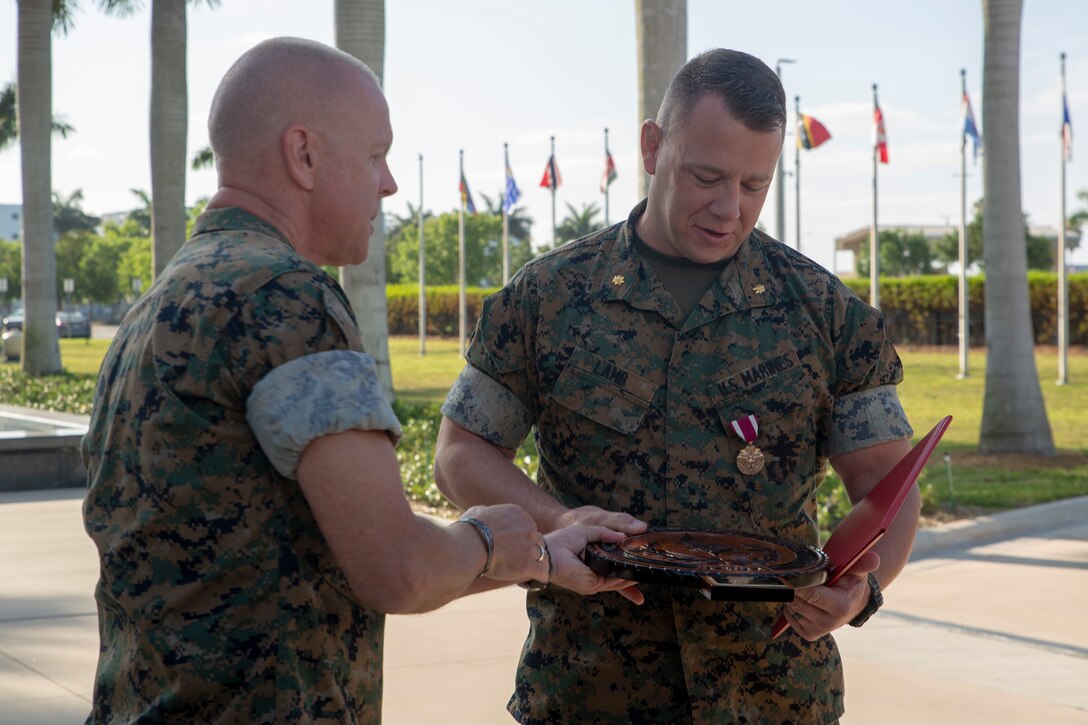 U.S. Marine Corps Forces, South awarded Maj Matthew Lamb the Meritorious Service Medal for his work as the staff secretary as his tour in Miami comes to an end, May 28, 2019.