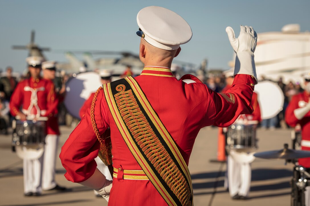 U.S. Marines assigned to the Battle Color Detachment, perform at the 2019 Yuma Twilight Show hosted by Marine Corps Air Station Yuma Ariz., March 9, 2019. The airshow is MCAS Yuma's only military airshow of the year and provides the community an opportunity to see thrilling aerial and ground performers for free while interacting with Marines and Sailors. (U.S. Marine Corps photo by Sgt. Allison Lotz)