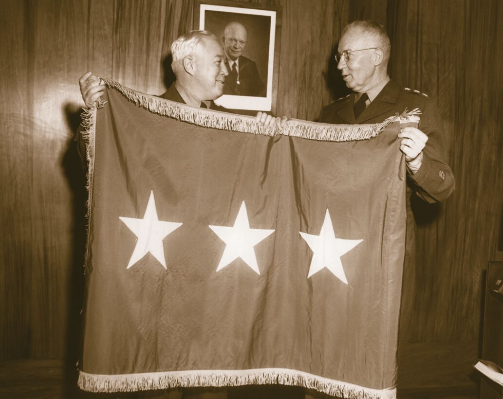 NSA Director Lieutenant General Ralph J. Canine, USA, receives three-star flag upon appointment to NSA, 1952