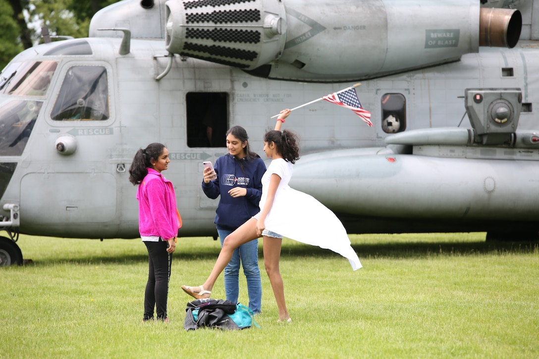 Students with Vocational and Technical High School attend Career Day, viewing some of the U.S. military capabilities, during Fleet Week New York (FWNY) in Bridgewater, NJ, May 24, 2019. FWNY provides an opportunity for Marines to interact with the citizens of New York City and the surrounding tristate area and teach them about the capabilities of the Marine Corps and how they support the defense of the nation. (U.S. photo by Sgt. Paul T. Williams III)