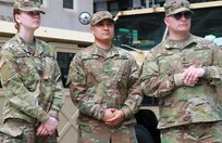 Pfc. Breanna Isakson of Belivedere, Illinois; Pfc. Byron Leon of Elk Grove Village, Illinois, and Staff Sgt. Ryan Kern of Chicago, Illinois; all of the 933rd Military Police Co., 404th MEB (Maneuver Enhancement Brigade), Illinois Army National Guard provided two static displays at Daley Plaza during Chicago Memorial Day events on May 25.