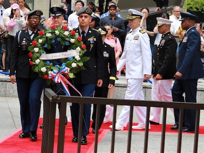 Brig. Gen. Richard R. Neely, The Adjutant General of the Illinois National Guard escorts the Armed Forces wreath during the Chicago Memorial Day Wreathlaying Ceremony at Daley Plaza on May 25 with other military dignitaries.