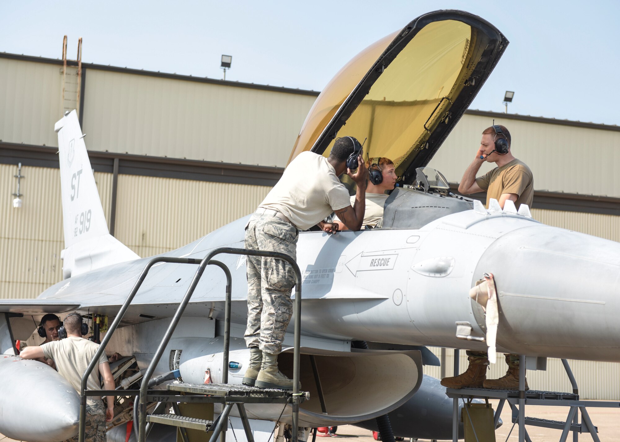 362nd Training Squadron F-16 crew chief apprentice course students work in the flight-deck of an F-16 Fighting Falcon aircraft trainer at Sheppard Air Force Base, Texas, May 28, 2019. Crew chiefs are in charge of performing pre- and post flight inspections, conduct functional checks and a lot more. (U.S. Air Force photo by Senior Airman Ilyana A. Escalona