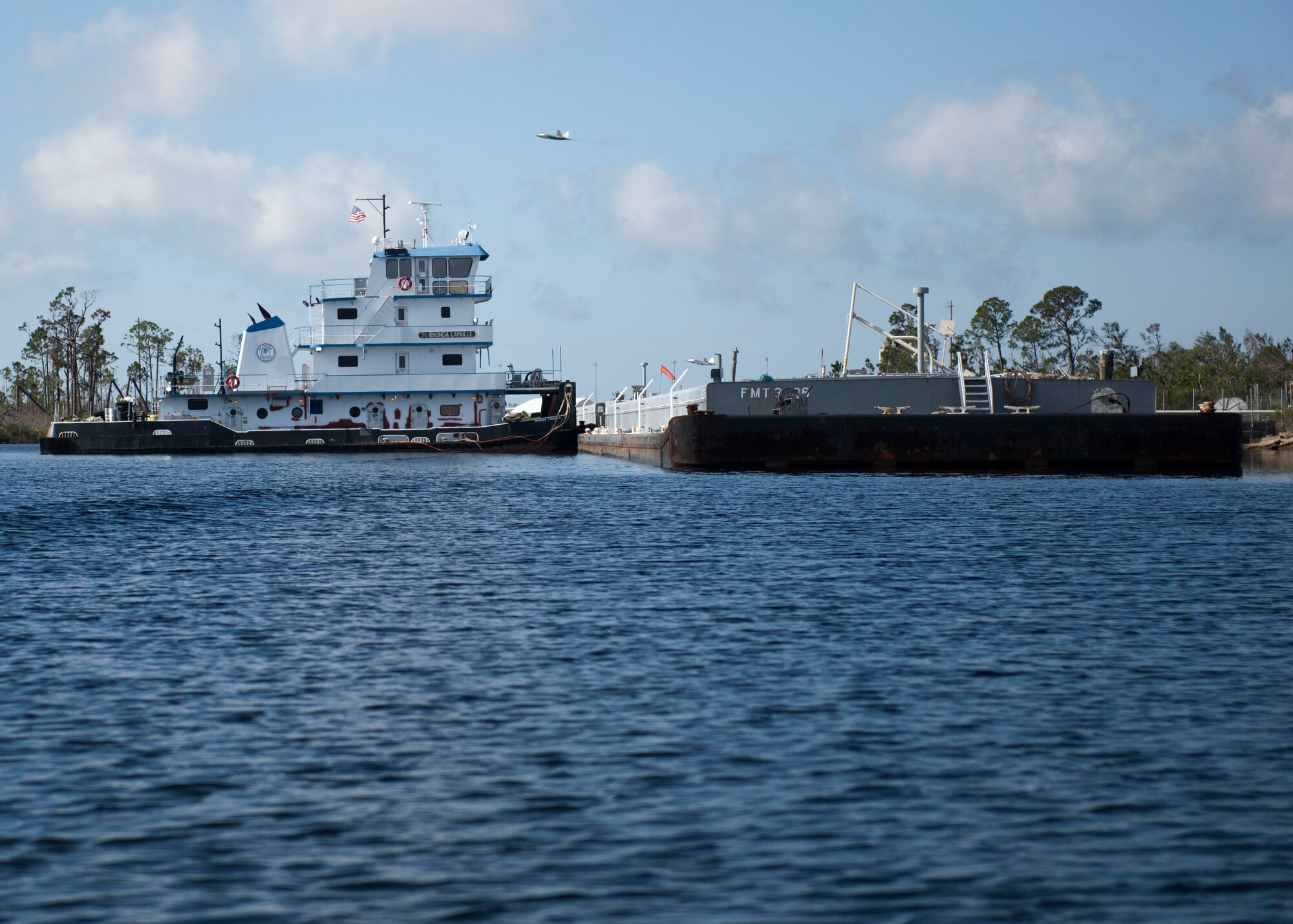 The Rhonda Lamulle from New Orleans, Louisiana, holds a fuel barge in place May 21, 2019, at Tyndall Air Force Base, Florida.