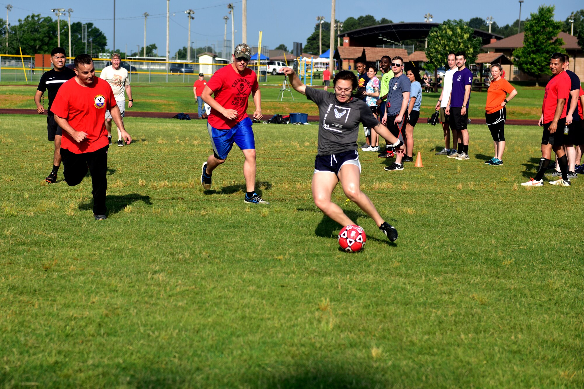 Airmen play soccer during Wingman Day.