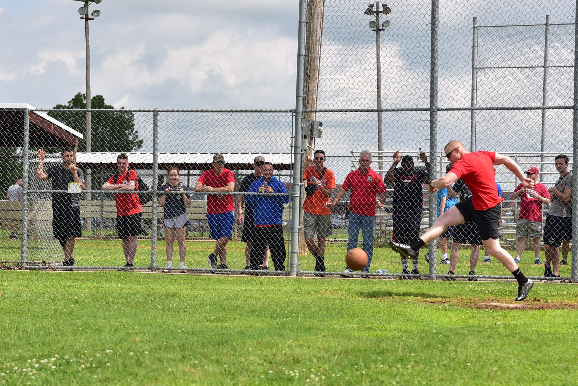 Airmen play kickball during Wingman Day.