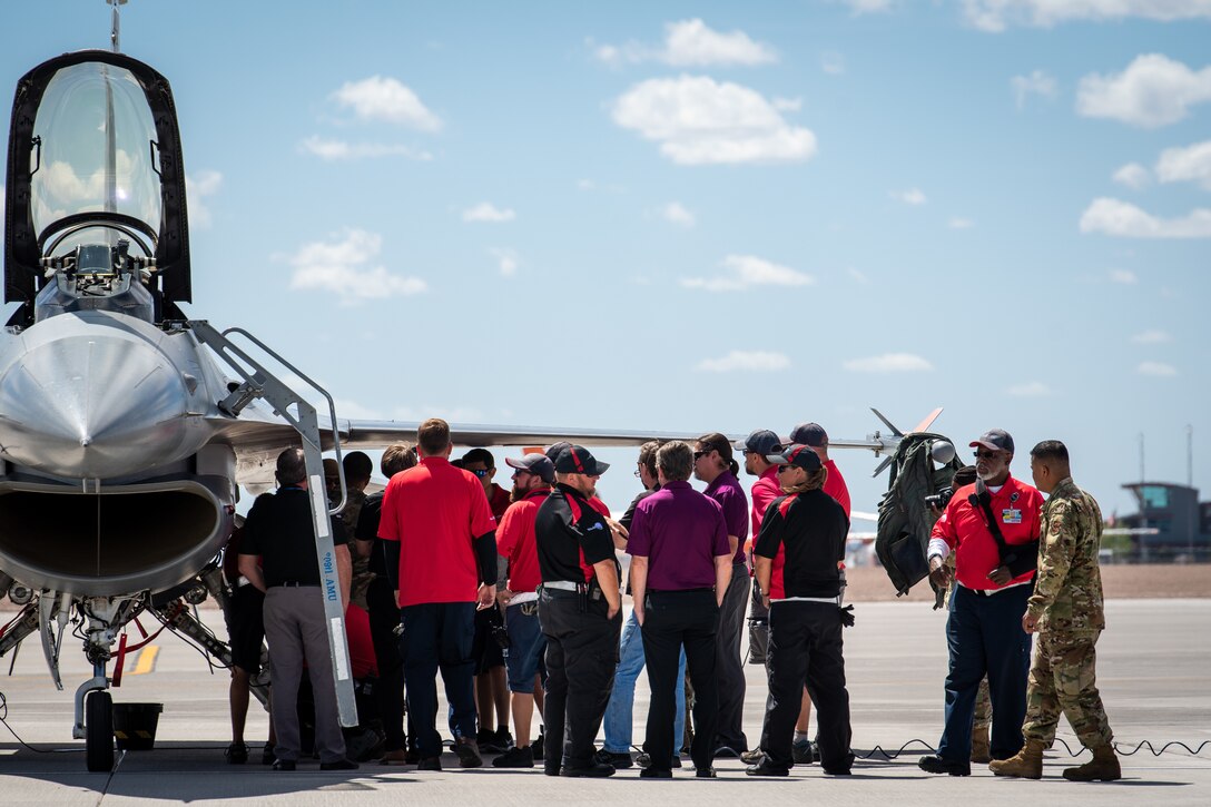 Airmen assigned to the 309th Aircraft Maintenance Unit provide an orientation of the F-16C Fighting Falcon, May 21, 2019, at Phoenix-Mesa Gateway Airport, Ariz.