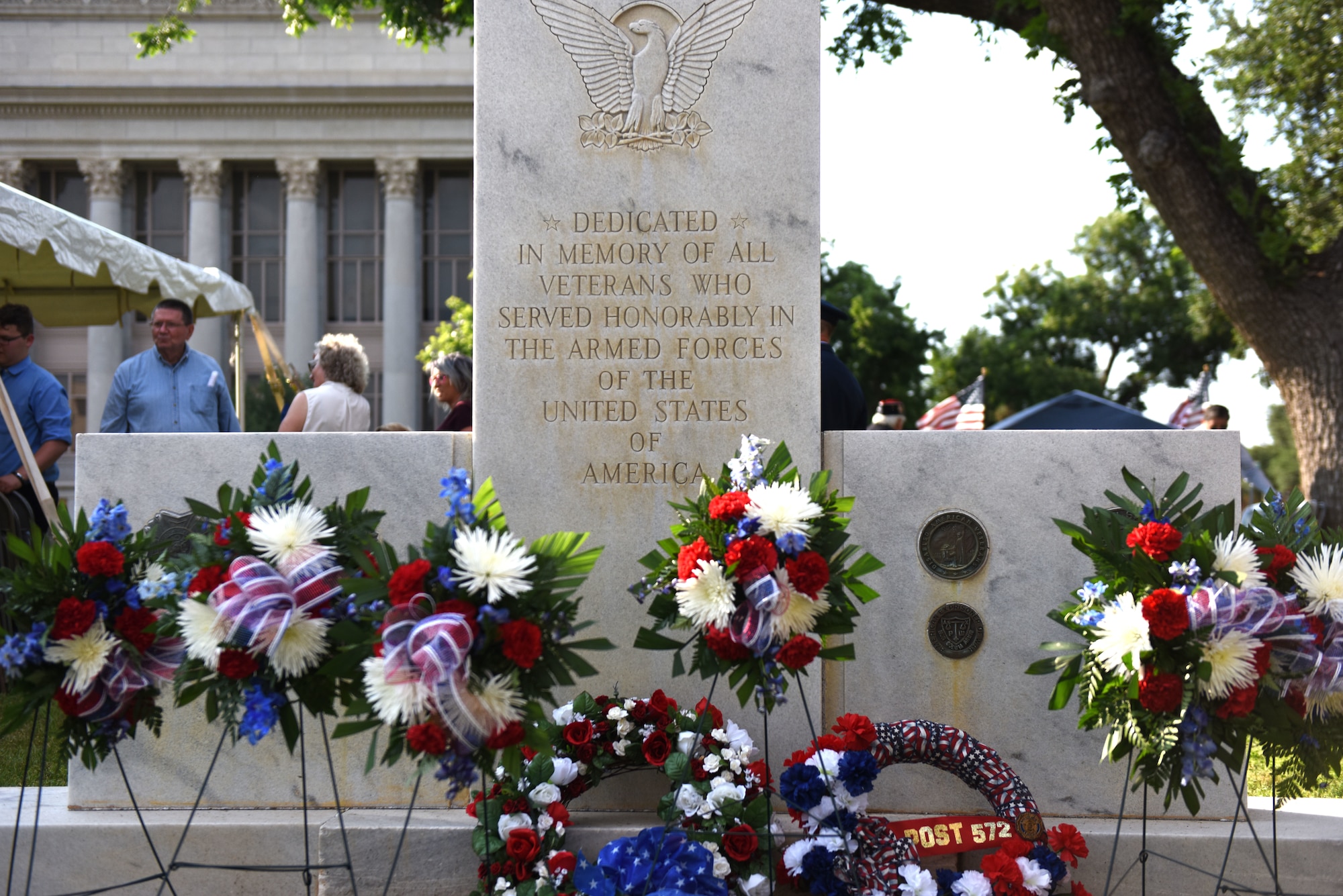 Wreaths are on display from San Angelo Veterans Organizations and Affiliates in front of the All Veterans Memorial in front of the Tom Greenp County Courthouse in San Angelo, Texas, May 27, 2019. The memorial is dedicated in memory of all the veterans who served honorably in the armed forces of the United States of America. (U.S Air Force photo by Senior Airman Seraiah Hines/Released)