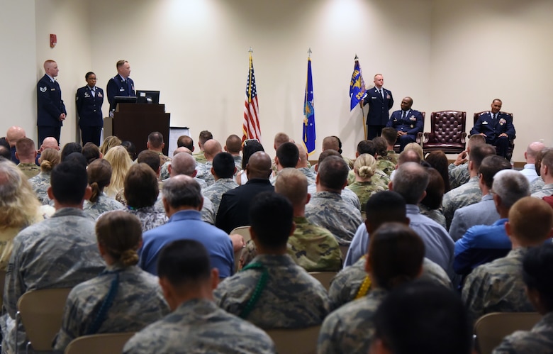 U.S. Air Force Lt. Col. Harry James, incoming 334th Training Squadron commander, delivers remarks during the 334th TRS change of command ceremony in the Roberts Consolidated Aircraft Maintenance Facility at Keesler Air Force Base, Mississippi, May 23, 2019. Prior to becoming the 334th TRS commander, James worked within the same squadron as the director of operations. (U.S. Air Force photo by Kemberly Groue)