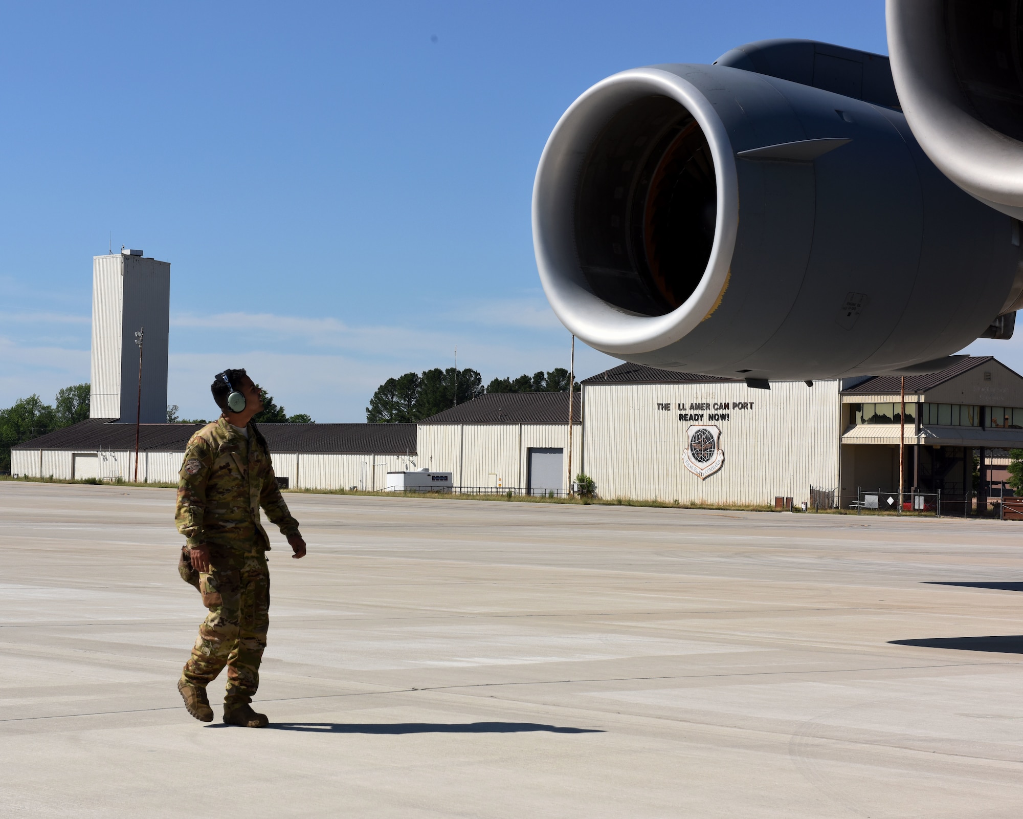 U.S. Air Force Staff Sgt. Andrew Torres-Cosme, 860th Aircraft Maintenance Squadron flying crew chief, checks the engines on a C-17 Globemaster III after landing May 21, 2019, at Pope Army Airfield, North Carolina. The C-17 is capable of rapid strategic delivery of troops and cargo anywhere in the world. (U.S. Air Force photo by 2nd Lt. R. Michael Longoria)