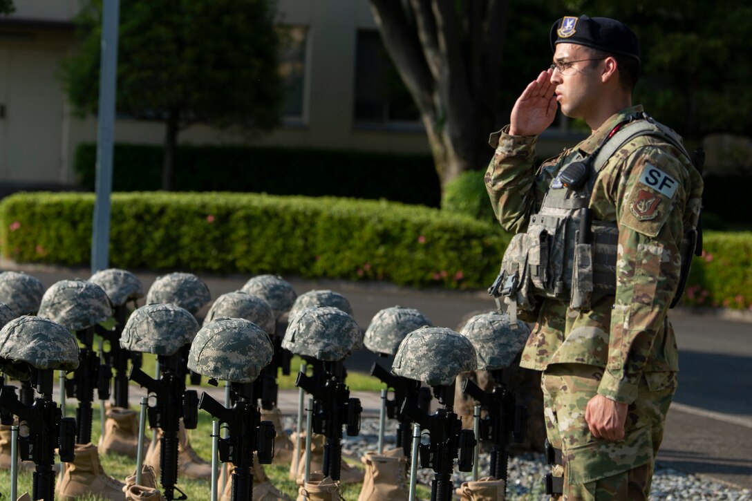 374th SFS Airmen finish Police Week with retreat ceremony