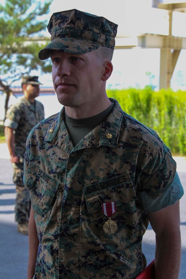 CAMP HUMPHREYS, Republic of Korea – Maj. Gen. Patrick J. Hermesmann, commander of U.S. Marine Corps Forces Korea, awards Maj. Todd Boese, MARFORK plans officer at the Joint U.S. Military Affairs Group/Korea, the Meritorious Service Medal here, 29 May. Boese received the Meritorious Service Medal for being a major contributor to the effective and timely move from USAG Yongsan to USAG Humphreys. (Official U.S. Marine Corps photo by Sgt. Nathaniel Hanscom/Released)