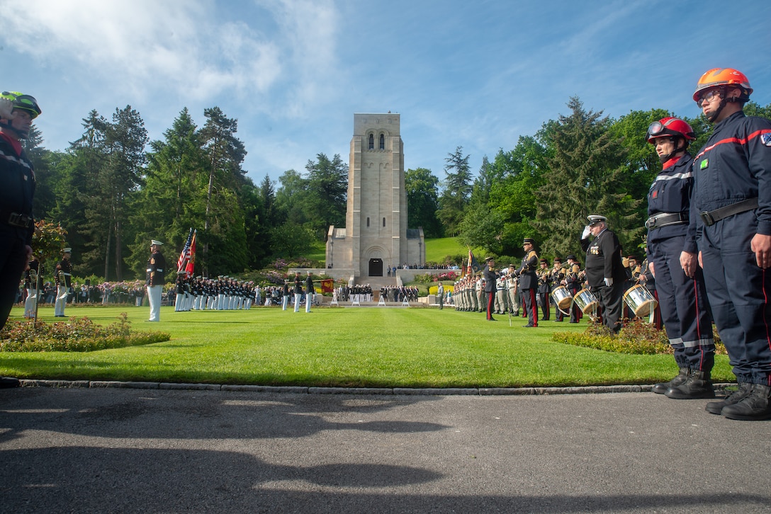 American, French, and German service members stand in formation during the Aisne-Marne Memorial Day ceremony at the Aisne-Marne American Cemetery near Belleau, France, May 26, 2019.