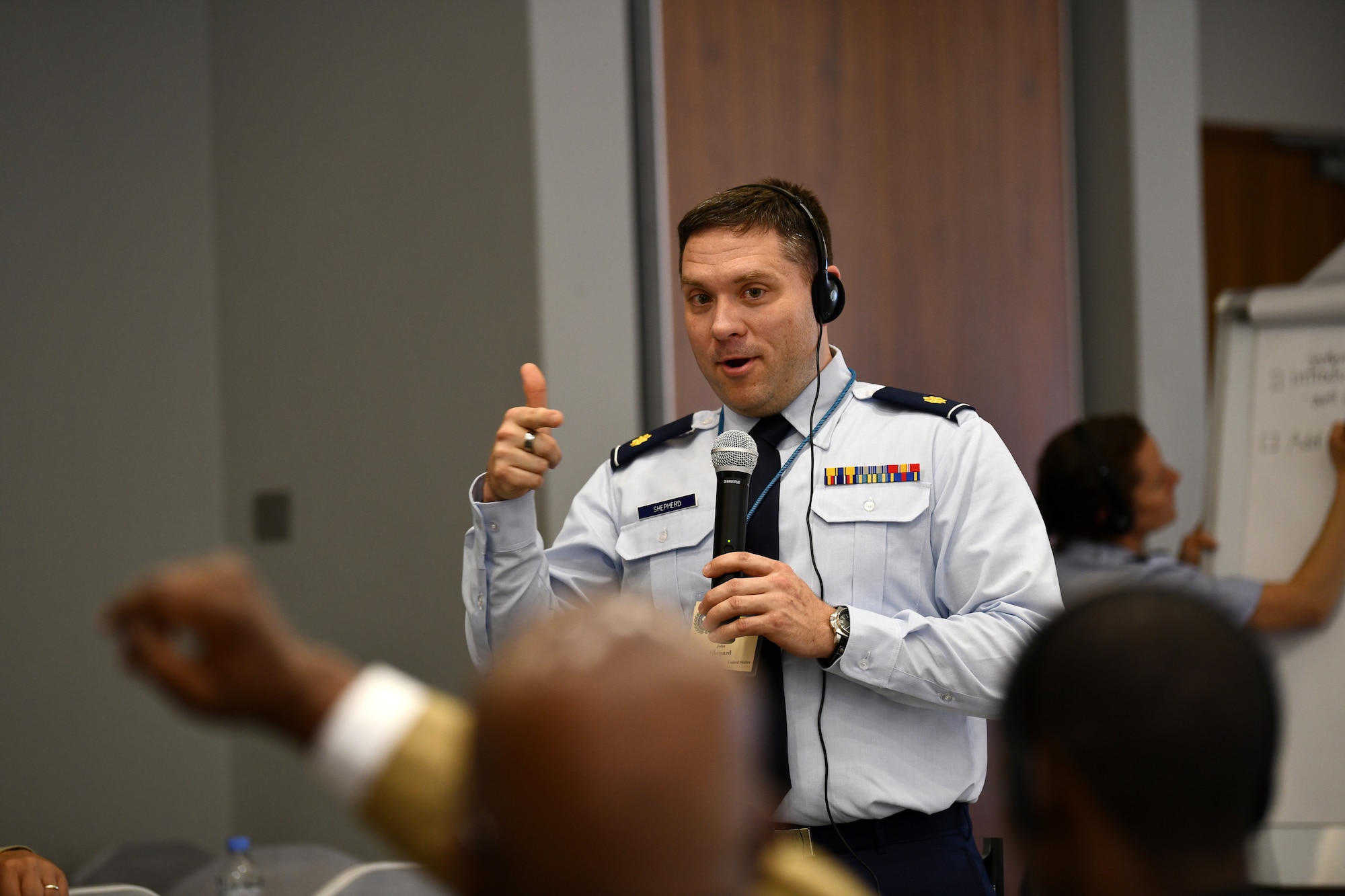 U.S. Air Force Maj. John Shepherd, a public health officer, facilitates discussions for one of the break out groups during the African Partner Outbreak Response Alliance (APORA) conference in Kigali, Rwanda on May 21, 2019. These break out groups focused on various subjects to include early warning and surveillance measures, logistical planning and preparedness. During APORA, military and civilian leaders worked together to align best practices and improve response capabilities for potential outbreaks of contagious diseases. The training helped bolster relationships with current partners and mobilize new partners to strengthen pandemic prevention programs. (U.S. Air Force photo by Master Sgt. Andy M. Kin)