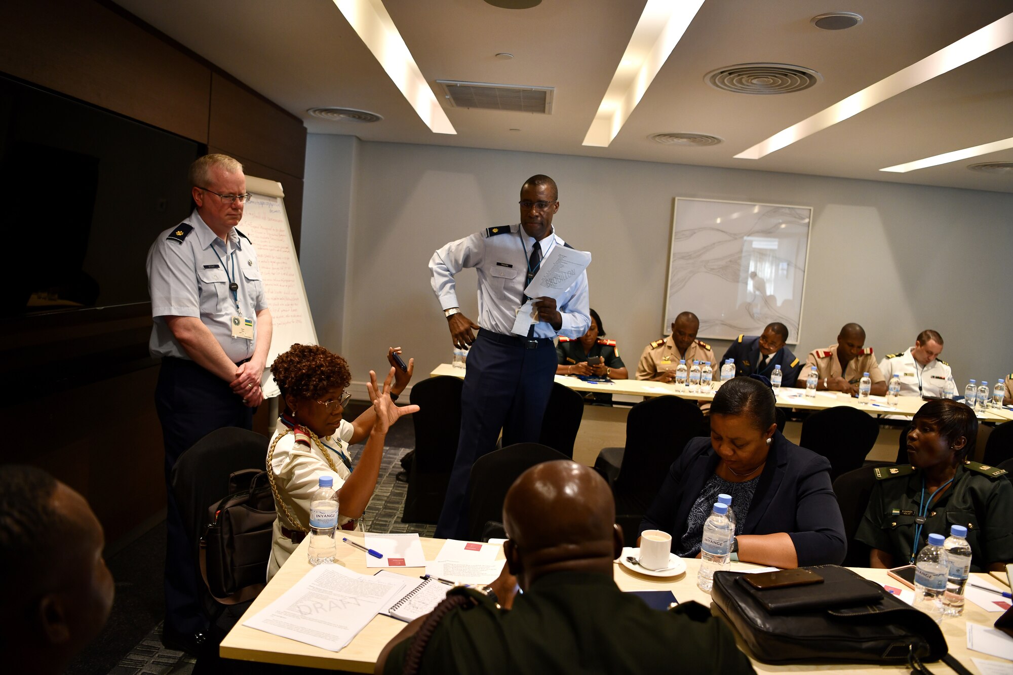 U.S. Air Force Maj. Malick Traore, an international health specialist, advances discussions for one of the break out groups during the African Partner Outbreak Response Alliance (APORA) conference in Kigali, Rwanda on May 21, 2019. These break out groups focused on various subjects to include early warning and surveillance measures, logistical planning and preparedness. During APORA, military and civilian leaders worked together to align best practices and improve response capabilities for potential outbreaks of contagious diseases. The training bolstered relationships with current partners and mobilize new partners to strengthen pandemic prevention programs. (U.S. Air Force photo by Master Sgt. Andy M. Kin)