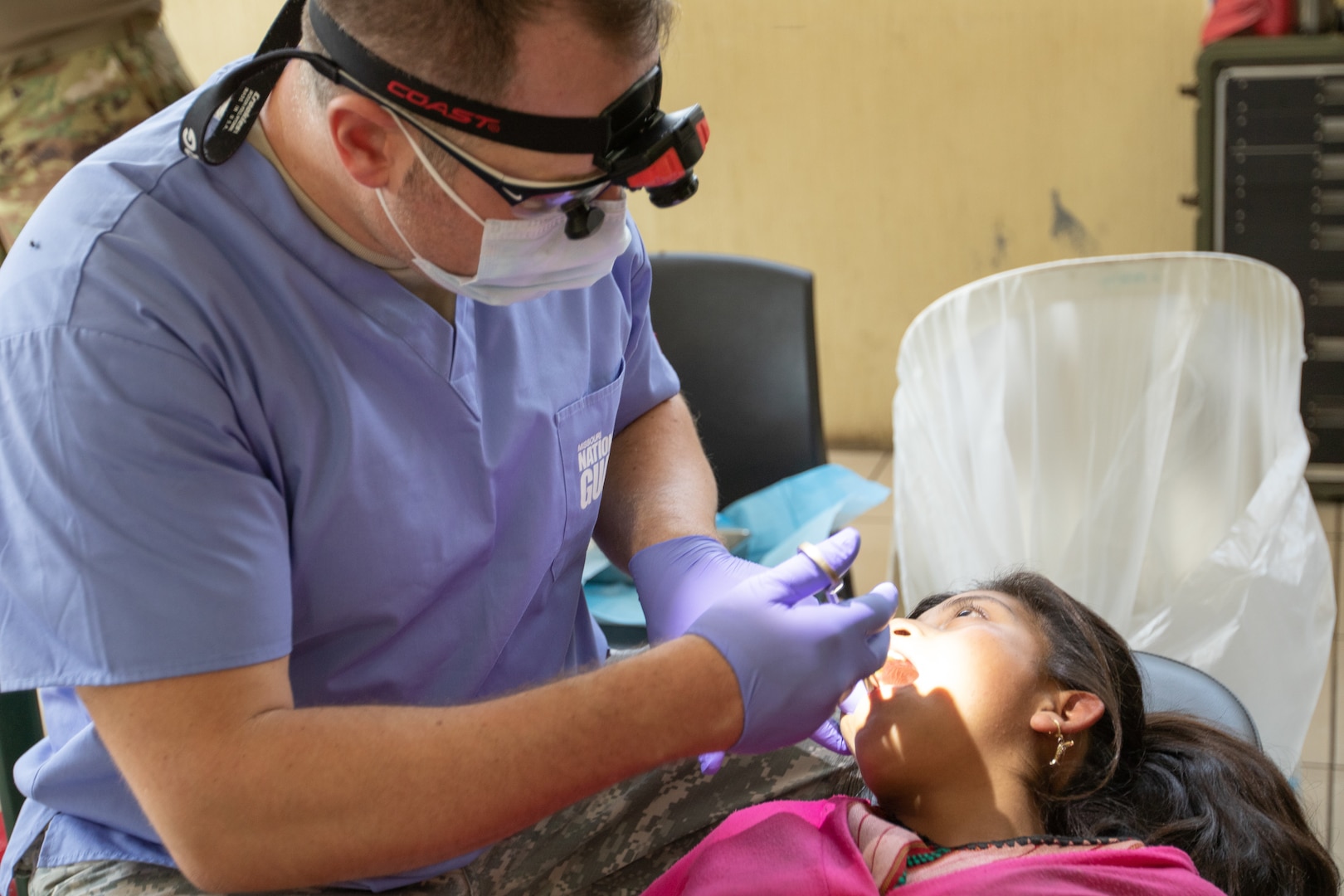 A doctor treats a patient.