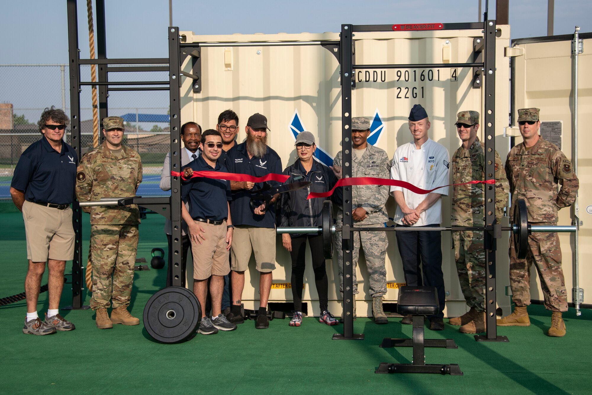 people cut ribbon