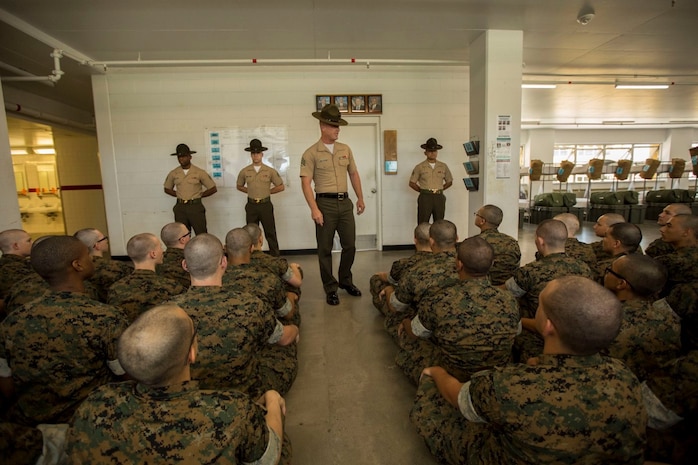 Drill instructors with India Company, 3rd Recruit Training Battalion, recite the Drill Instructor Creed during pick up at Marine Corps Recruit Depot San Diego, May 17.