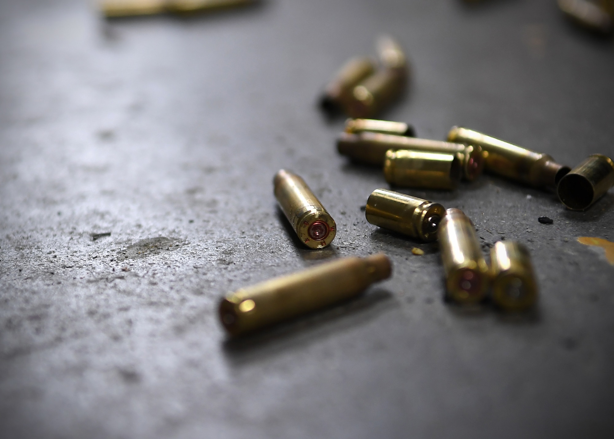 Empty shell casings scatter the ground of the shooting range May 16, 2019, on Grand Forks Air Force Base, North Dakota. The rounds were used during an excellence-in-competition shooting match, which was open to all active duty members on Grand Forks AFB. (U.S. Air Force photo by Senior Airman Elora J. Martinez)