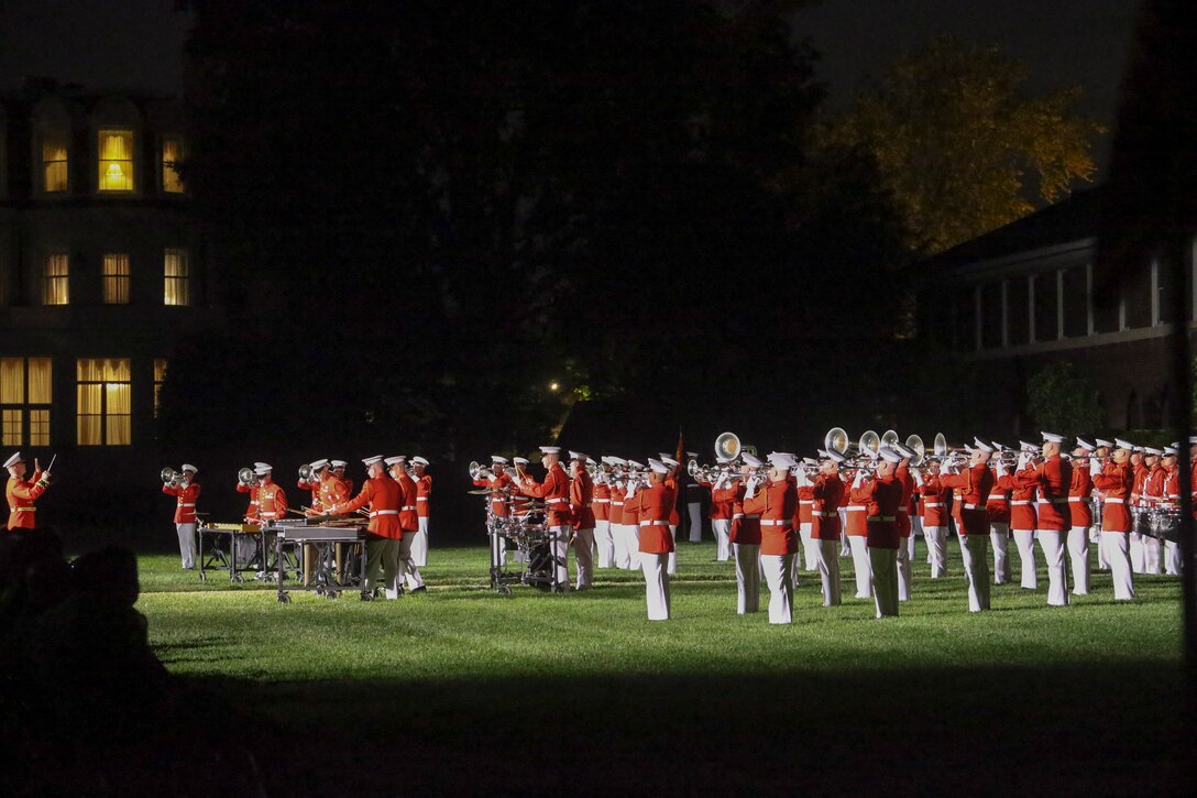 Marines with the “The Commandant’s Own,” U.S. Marine Drum and Bugle Corps perform during a Friday Evening Parade at Marine Barracks Washington, D.C., May 5, 2019. The hosting official for the evening was the 19th Chairman of the Joint Chiefs of Staff Gen. Joseph F. Dunford, and the guest of honor was Ms. Bonnie Carroll, the president and founder of the Tragedy Assistance Program for Survivors and 2015 Presidential Medal of Freedom recipient. (U.S. Marine Corps photo by Pfc. Allen Sanders)