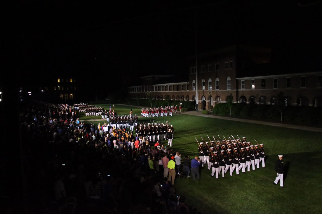 Marine with Marine Barracks Washington D.C. march across the parade deck for “pass in review” during a Friday Evening Parade at the Barracks, May 5, 2019. The hosting official for the evening was the 19th Chairman of the Joint Chiefs of Staff Gen. Joseph F. Dunford, and the guest of honor was Ms. Bonnie Carroll, the president and founder of the Tragedy Assistance Program for Survivors and 2015 Presidential Medal of Freedom recipient.