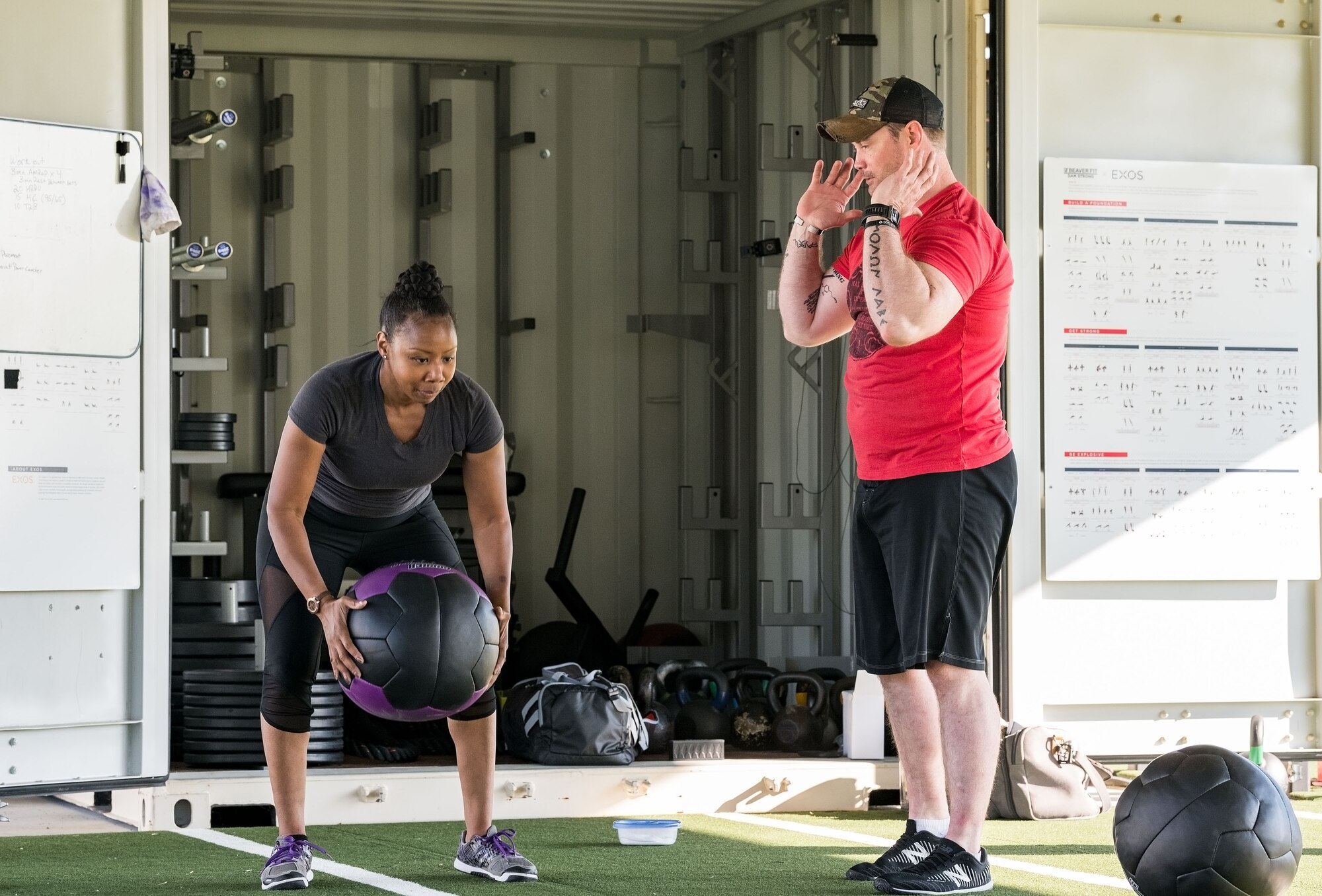 Tech. Sgt. William “Bradley” Martineau, 436th Aerial Port Squadron special handling supervisor and lead volunteer Warrior Fitness class instructor, watches Master Sgt. Sabrina Spriggs, 515th Air Mobility Operations Wing budget analyst, for proper form during a Warrior Fitness class May 16, 2019, at the Fitness Center on Dover Air Force Base, Del. Spriggs was an inspector for the 436th Airlift Wing’s Unit Effectiveness Inspection. Warrior Fitness is free to all with base and Fitness Center access. (U.S. Air Force photo by Roland Balik)