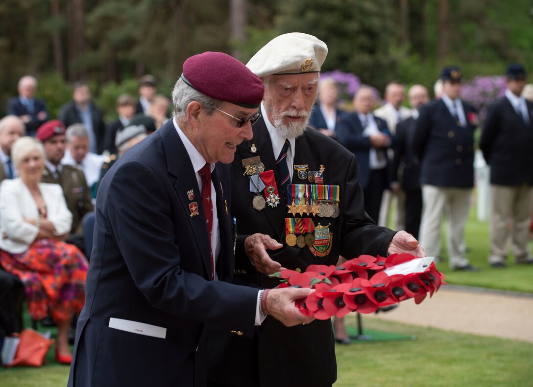 Lewis Turner, Royal Navy Normandy Veterans, presents a wreath to honor the lives and legacy of fallen U.S. service members at the Brookwood American Military Cemetery, Surrey, England, May 26, 2019. Throughout the course of U.S. history, Soldiers, Sailors, Airmen and Marines have given their lives in defense of the Nation. On Memorial Day, we pay solemn tribute to their ultimate sacrifice. (U.S. Air Force photo by Airman 1st Class Jennifer Zima)
