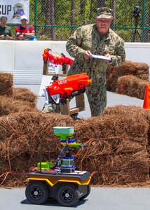 Capt. Aaron Peters, Naval Surface Warfare Center Panama City Division commanding officer, serves as a judge at the 2019 Director's Cup competition May 22.