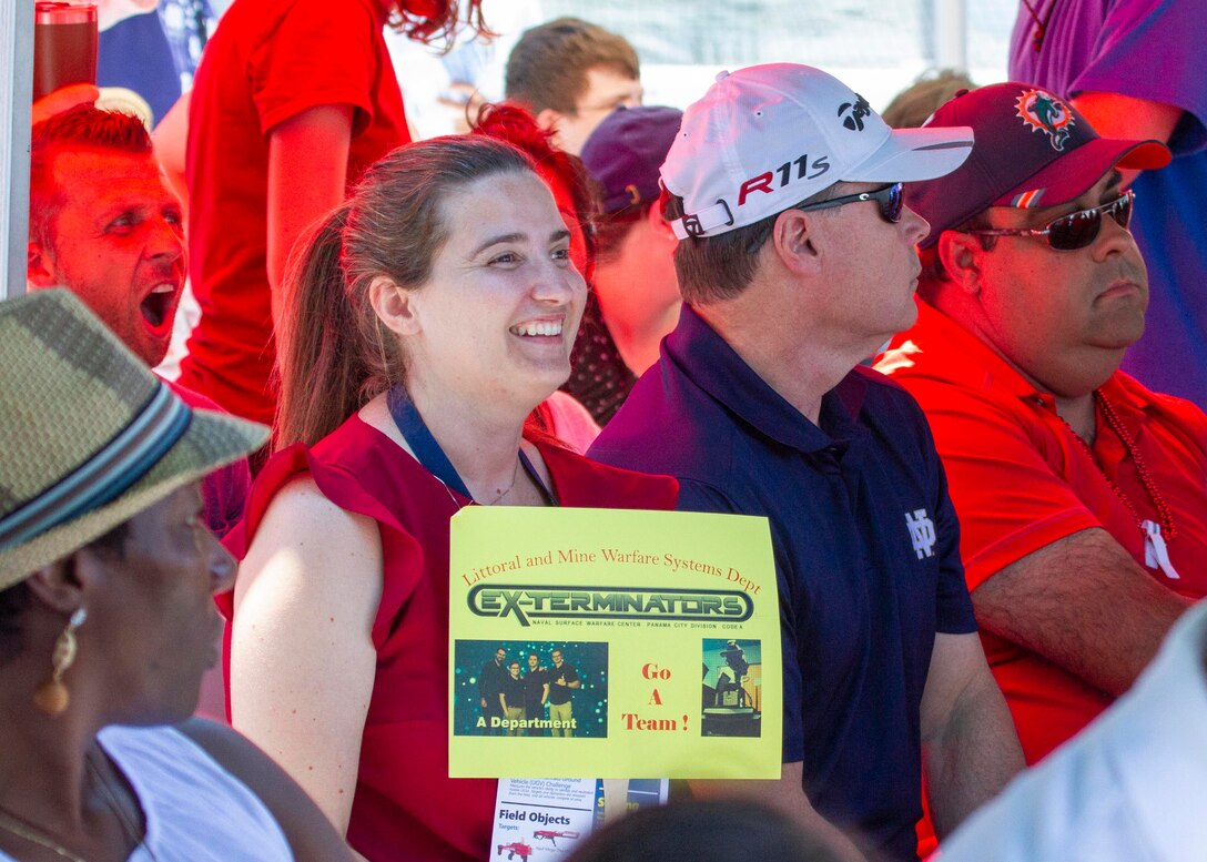 Waves of patriotic patrons packed the Naval Support Activity Panama City Roller Hockey Rink for Naval Surface Warfare Center Panama City Division's 2019 Director's Cup competition May 22. Each technical department was represented by donning red, white, or blue.