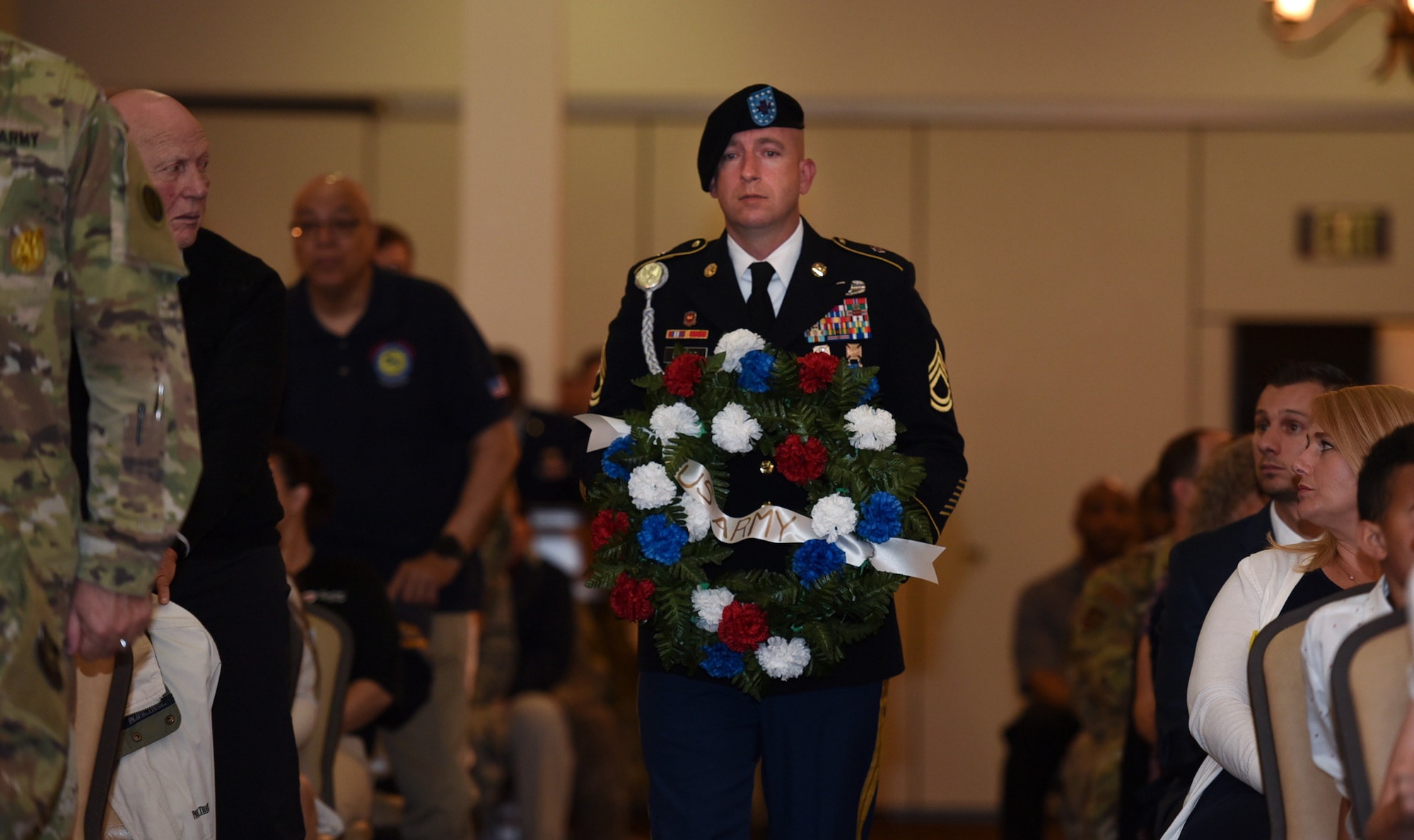 A Soldier carries the U.S. Army wreath during the 37th Annual Parade of Wreaths on Joint Base McGuire-Dix-Lakehurst, New Jersey, May 23, 2019. Each branch of service had a wreath to represent the men and women who died while serving in the armed forces. Not only were fallen military members honored but all federal law enforcement as well. (U.S. Air Force photo by Airman 1st Class Ariel Owings)