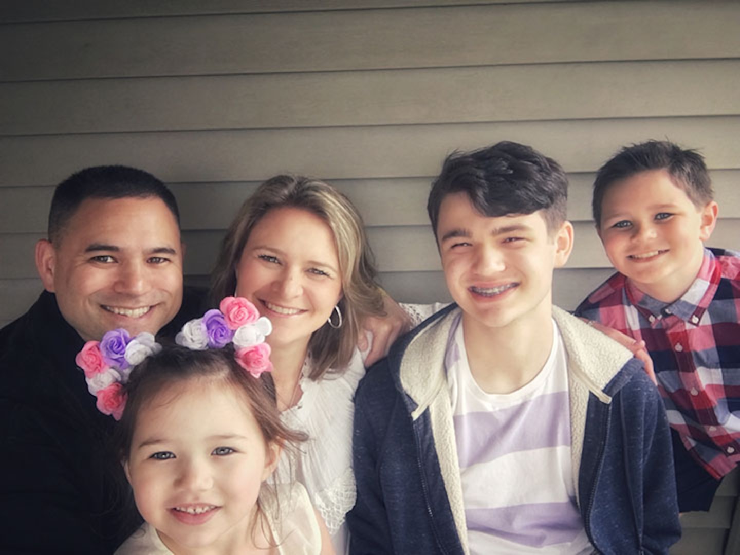 Maj. Nicholas Chou, the 73rd Troop Command Brigade chaplain, poses for an Easter 2019 photo with his wife, Sarah, who is a nurse. Also pictured are his three children: Taylor, from right, 10, who plays soccer; Tyler, right, 13, who plays basketball and does theater and Lily, 5, who does gymnastics.