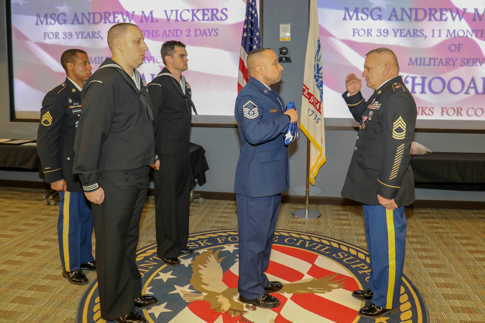 Joint Task Force Civil Support (JTF-CS) celebrates the retirement and accomplishments of retired Army Master Sgt. Andrew Vickers after 39 years, 11 months and 2 days of service. Vickers continues serving as a GS employee at JTF-CS as the J43 logistics officer. During his reitement ceremony, Vickers was joined by his friends and family, including his wife Karen, his sons Jason and Jeremy and his grandchildren Natalie and Deacon. (Official DoD photo by Mass Communication Specialist 3rd Class Michael Redd/released)