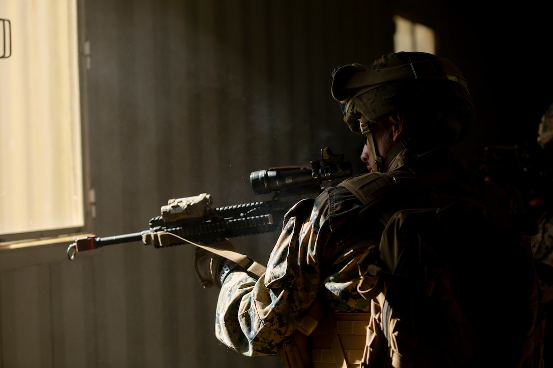 A U.S. Marine with the Ground Combat Element, Marine Rotational Force — Darwin, provides security during military operations in urban terrain training as a part of Exercise Carabaroo, Shoalwater Bay Training Area, Queensland, Australia, May 29, 2019. Carabaroo is a trilateral exercise hosted by 8th/9th Battalion, Royal Australian Regiment, in conjunction with MRF-D Marines and service members from the Armed Forces of the Philippines and focuses on interoperability between the U.S. and partnered nations.