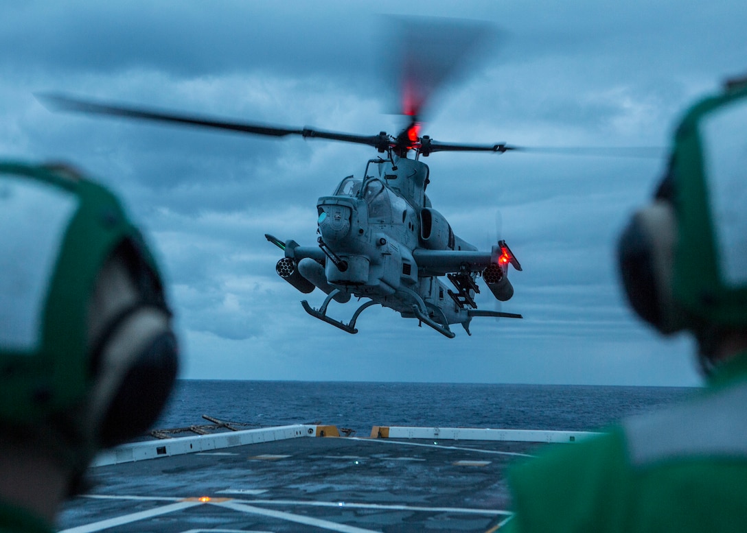U.S. Marines with Marine Medium Tiltrotor Squadron 163, 11th Marine Expeditionary Unit, prepare to land an AH-1Z Viper aboard the San Antonio-class amphibious transport dock ship USS John P. Murtha. The Marines and Sailors of the 11th MEU are deployed to the U.S. 7th Fleet area of operations to support regional stability, reassure partners and allies, and maintain a presence postured to respond to any crisis ranging from humanitarian assistance to contingency operations.