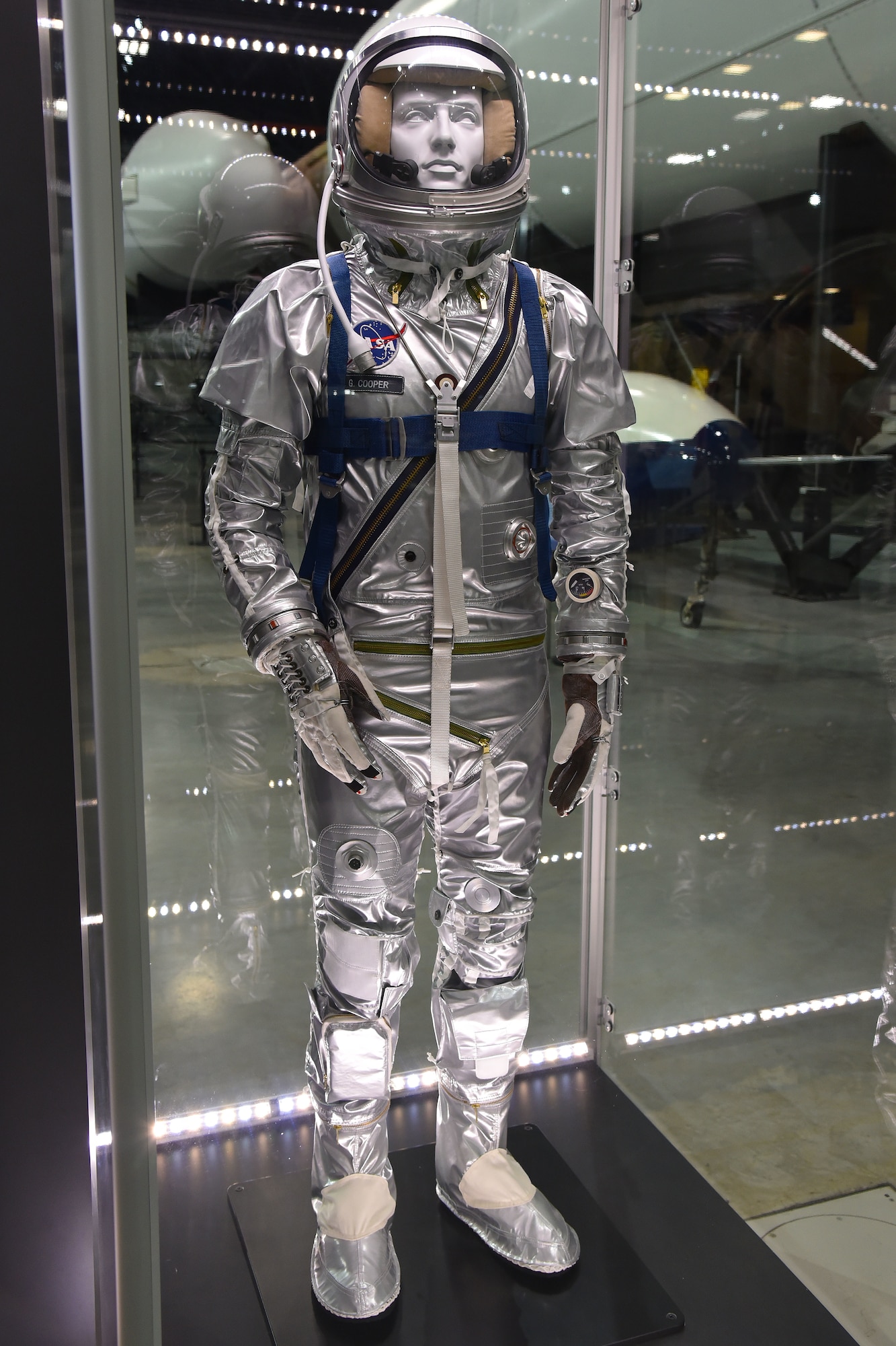 This space suit represents the one worn by U.S. Air Force Maj. (later Col.) Gordon Cooper in May 1963 aboard his Mercury craft called Faith 7, in which he flew 22 orbits in a 34-hour mission. This suit is a reproduction and is on display in the museum's fourth building.(U.S. Air Force photo by Ken LaRock)