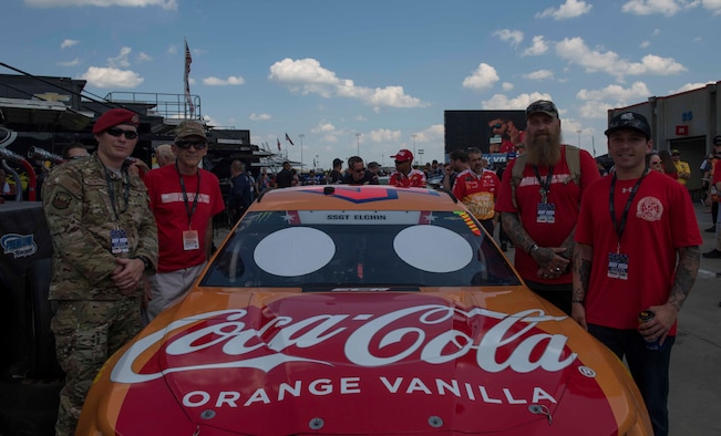 Family members and teammates of U.S. Air Force Staff Sgt. Dylan Elchin pose in front of the #43 Coca-Cola Chevy, which bares Elchin’s name on the windshield, before the NASCAR Coca-Cola 600 Miles of Remembrance race on May 26, 2019, Concord, North Carolina. Elchin, a Special Tactics combat controller, was killed in action when his vehicle hit an improvised explosive device in Ghazni Province, Afghanistan, Nov. 27, 2018, while deployed in support of Operation Freedom’s Sentinel. (U.S. Air Force photo by Senior Airman Rachel Yates)