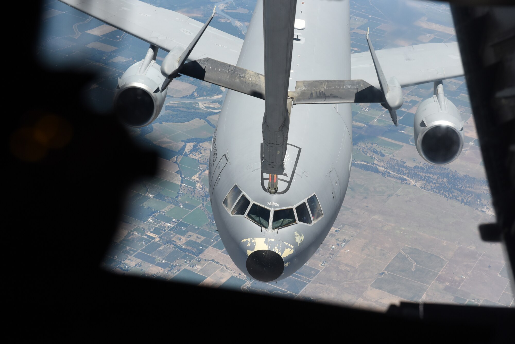 A KC-10 Extender refuels another KC-10 during an orientation flight with 21 Air Force Reserve Officer Training Corps cadets May 23, 2019, out of Travis Air Force Base, California. Twenty-One Air Force ROTC cadets visited Travis for close to three weeks to gain a better understanding of the operational Air Force. (U.S. Air Force photo by Airman 1st Class Cameron Otte)