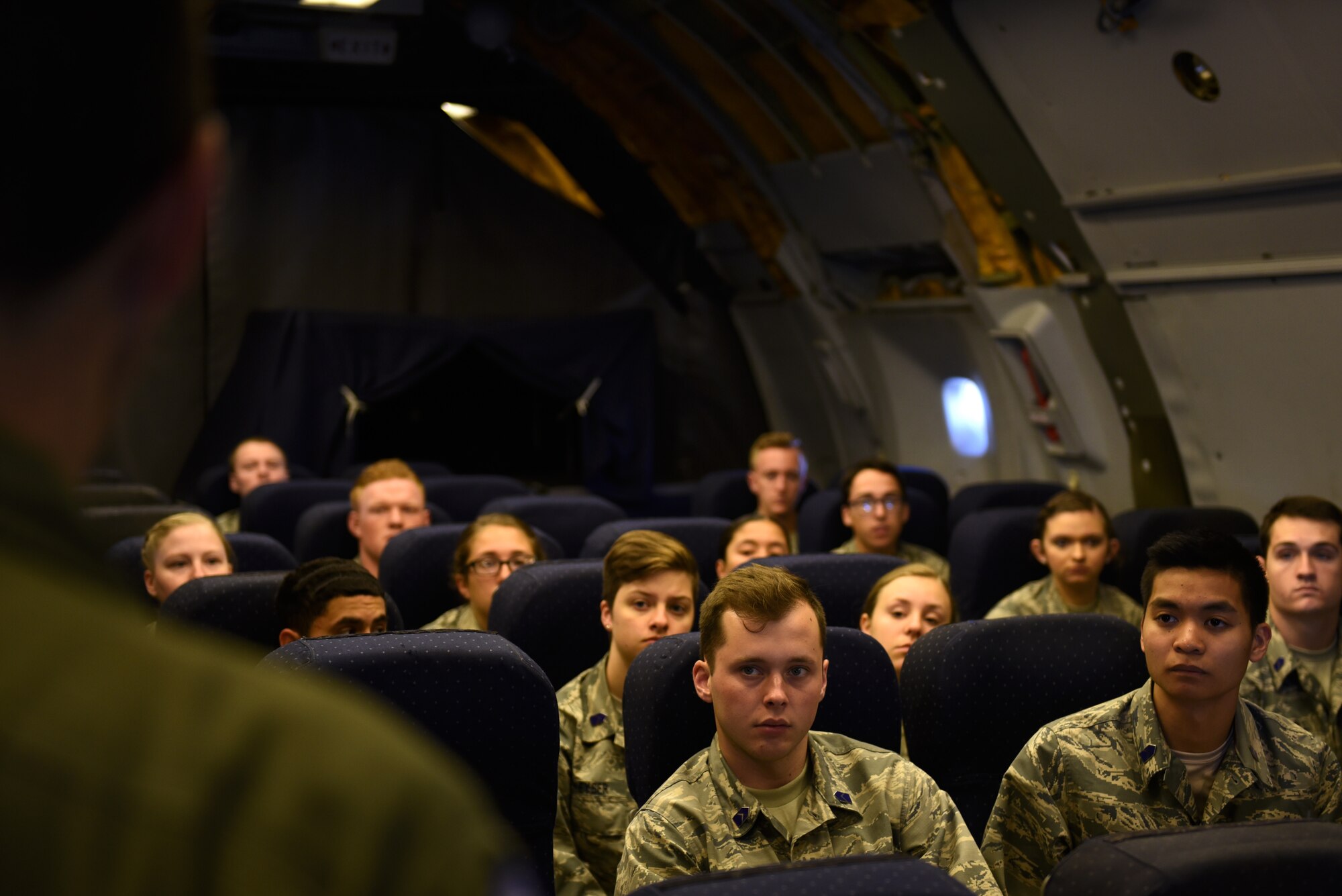 U.S. Air Force Senior Master Sgt. Matthew Fisher, 70th Air Refueling Squadron, boom operator, briefs a group of Reserve Officer Training Corps cadets on refueling operations May 23, 2019 at Travis Air Force Base, California. Twenty-One Air Force ROTC cadets visited Travis for close to three weeks to gain a better understanding of the operational Air Force. (U.S. Air Force photo by Airman 1st Class Cameron Otte)