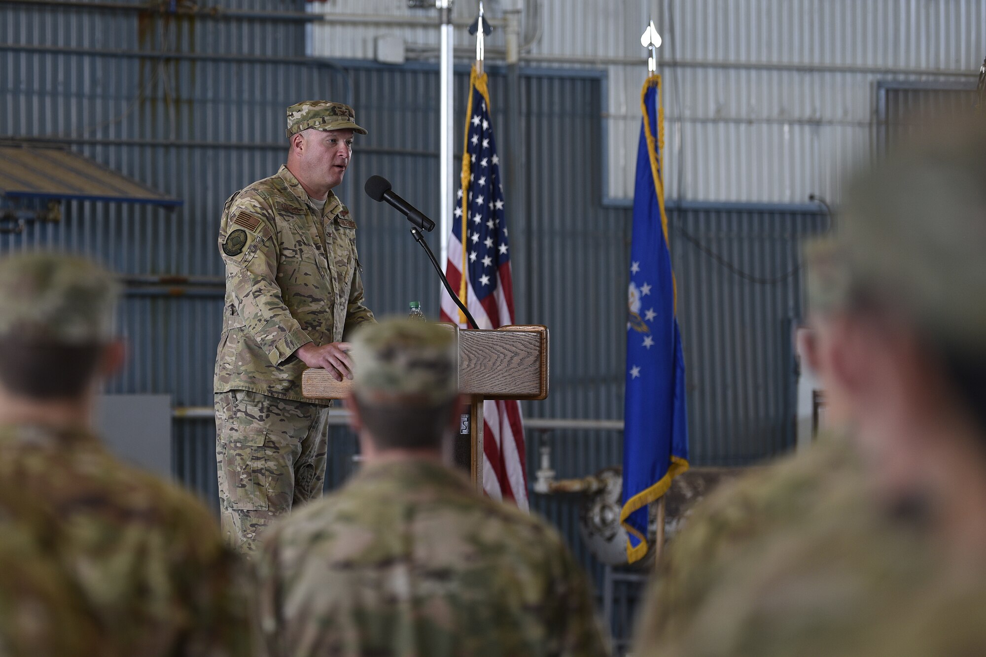 Col. Richard Carrell, 58th Operations Group commander, speaks to members of the 512th Rescue Squadron during the 512th RQS change of command ceremony at Kirtland Air Force Base, N.M., May 23, 2019. The mission of the 512 RQS is to prepare mission-ready aircrew for personnel recovery, nuclear enterprise security and support, and distinguished visitor airlift at operational units across the Air Force.  (U.S. Air Force photo by Airman 1st Class Austin J. Prisbrey)