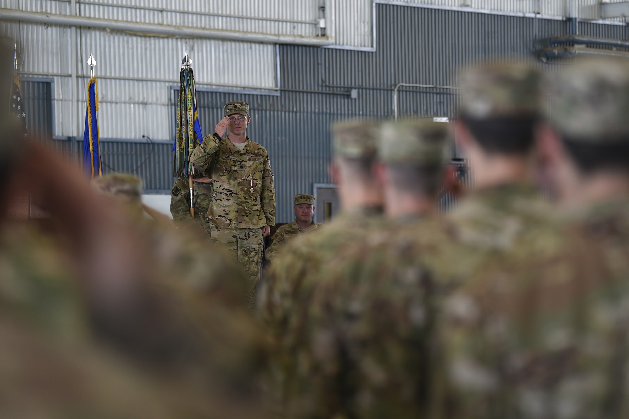 Lt. Col. Andrew Gray, former 512th Rescue Squadron commander, renders a final salute during the 512th RQS change of command ceremony at Kirtland Air Force Base, N.M., May 23, 2019. The mission of the 512 RQS is to prepare mission-ready aircrew for personnel recovery, nuclear enterprise security and support, and distinguished visitor airlift at operational units across the Air Force. (U.S. Air Force photo by Airman 1st Class Austin J. Prisbrey)