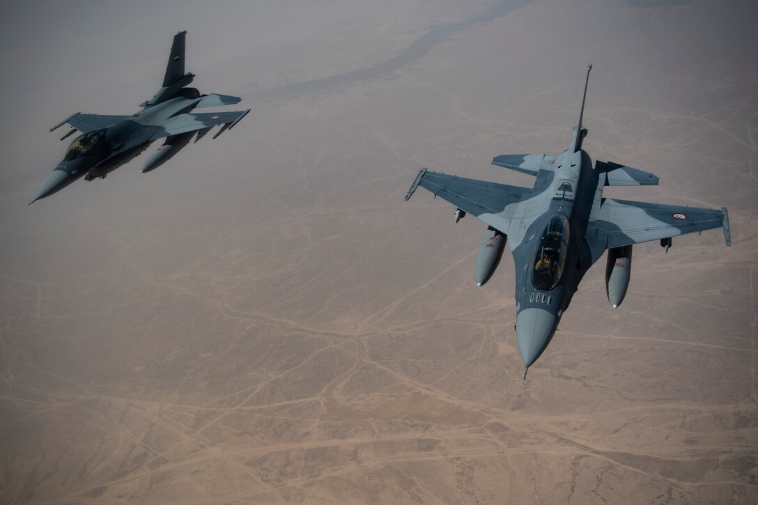 Iraqi Air Force F-16 Fighting Falcons conduct a training mission over Iraq May 26, 2019. The Coalition Aviation Advisory and Training Team in partnership with the Office of Security Cooperation-Iraq, provides training, advising and assistance in addition to building partner capacity for Iraqi Army Aviation Command, Iraqi Air Defense Command and the Iraqi Air Force.