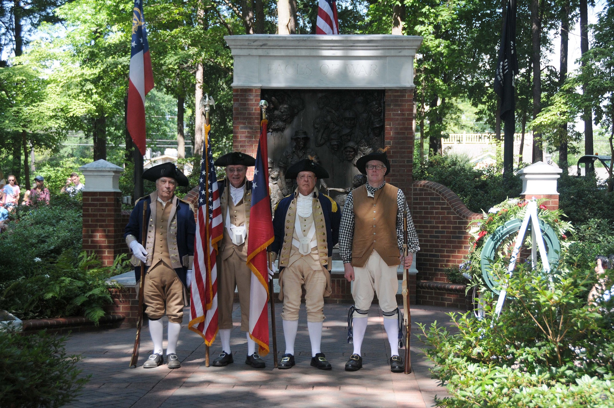 Members of the color guard pose before the start of a Memorial Day service at Roswell City Hall area, Roswell, GA, May 27, 2019. The Roswell Memorial Day service is held annually. The event had displays of historical and current military equipment, along with guest speakers who preserved the memories of what has been done on behalf of the citizens of the country. (U.S. Air Force photo by Senior Airman Justin Clayvon)