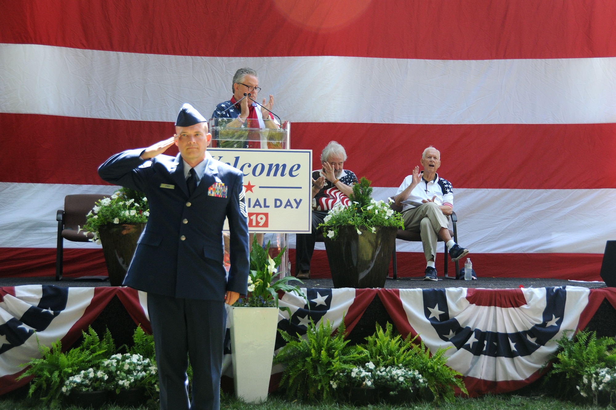 Chief Master Sgt. Marvin Jones, 94th Aircraft Maintenance Squadron superintendent, salutes during the service at the Roswell Memorial Day Ceremony at Roswell City Hall area, Roswell, GA on May 27, 2019. . At the event, all branches of the military were represented and individual service representatives from each branch participated in the mixed service recognition portion of the program. (U.S. Air Force photo by Senior Airman Justin Clayvon)