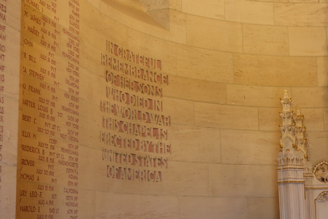 The Aisne-Marne American Chapel sits at foothill of Belleau Wood, contains the graves of 2,289 war dead. Inscribed on its walls are the names of 1,060 missing personnel. A monument at the flagpole commemorates the valor of the U.S. Marines who captured much of this ground in 1918.
