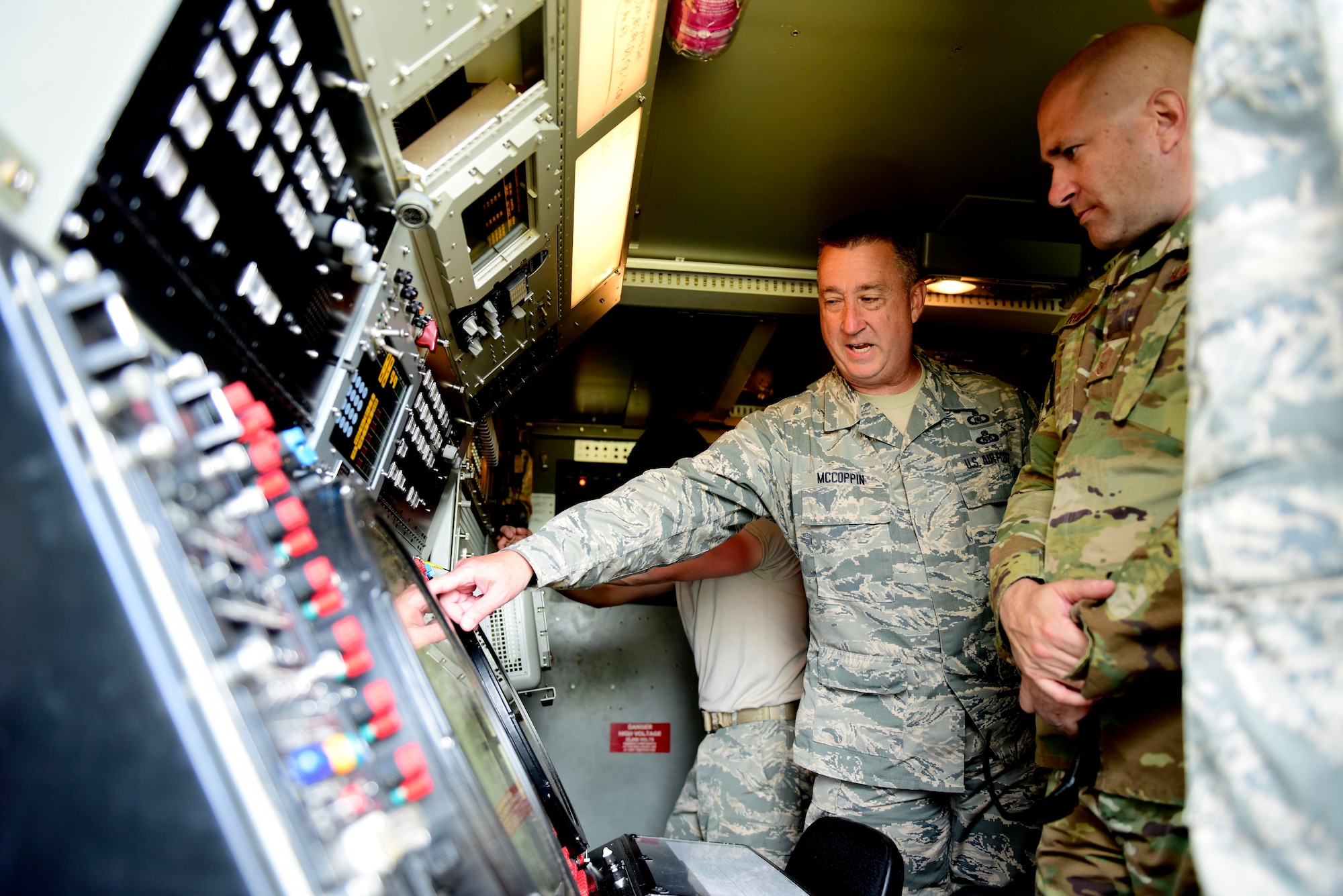 U.S. Air Force Master Sgt. Heath McCoppin, 123rd Air Control Squadron Electronic Protection Technician, explains TPS-75 radar operations to Chief Master Sgt. Toby Roach, 31st Operations Group Superintendent at Pula Airport, Croatia, May 28, 2019. Members of the 123rd Air Control Squadron, an Ohio Air National Guard unit, is augmenting the 606th Air Control Squadron during exercise Astral Knight 2019. (U.S. Air Force photo by Staff Sgt. Tory Cusimano)