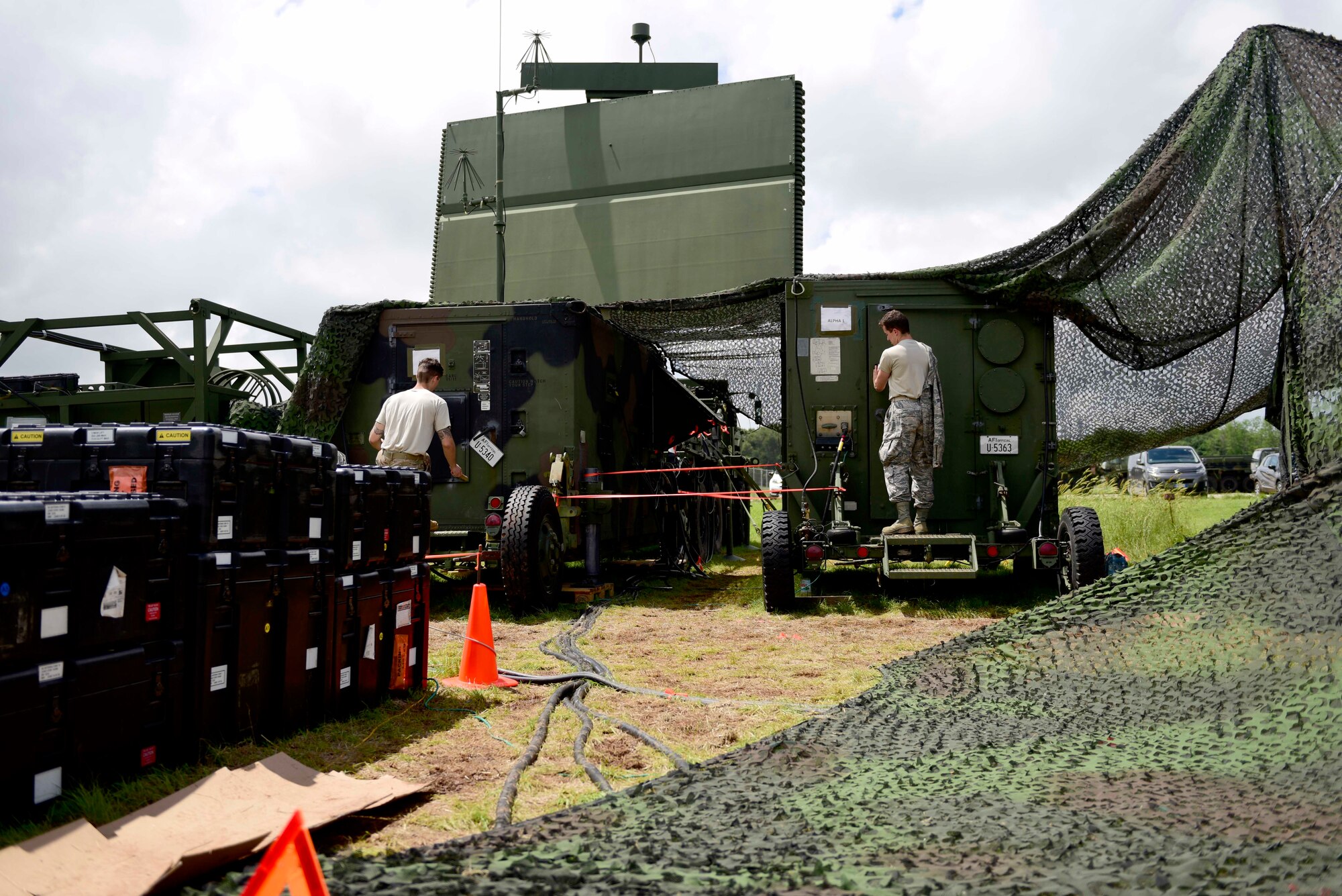 Airmen from the 606th Air Control Squadron prepare for work on the TPS-75 radar system at Pula Airport, Croatia, May 28, 2019. The 606th ACS is in Croatia to support Astral Knight 2019, which aims to demonstrate the integration, coordination, and interoperability of joint existing command and control at the operation and tactical levels. (U.S. Air Force photo by Staff 
Sgt. Tory Cusimano)
