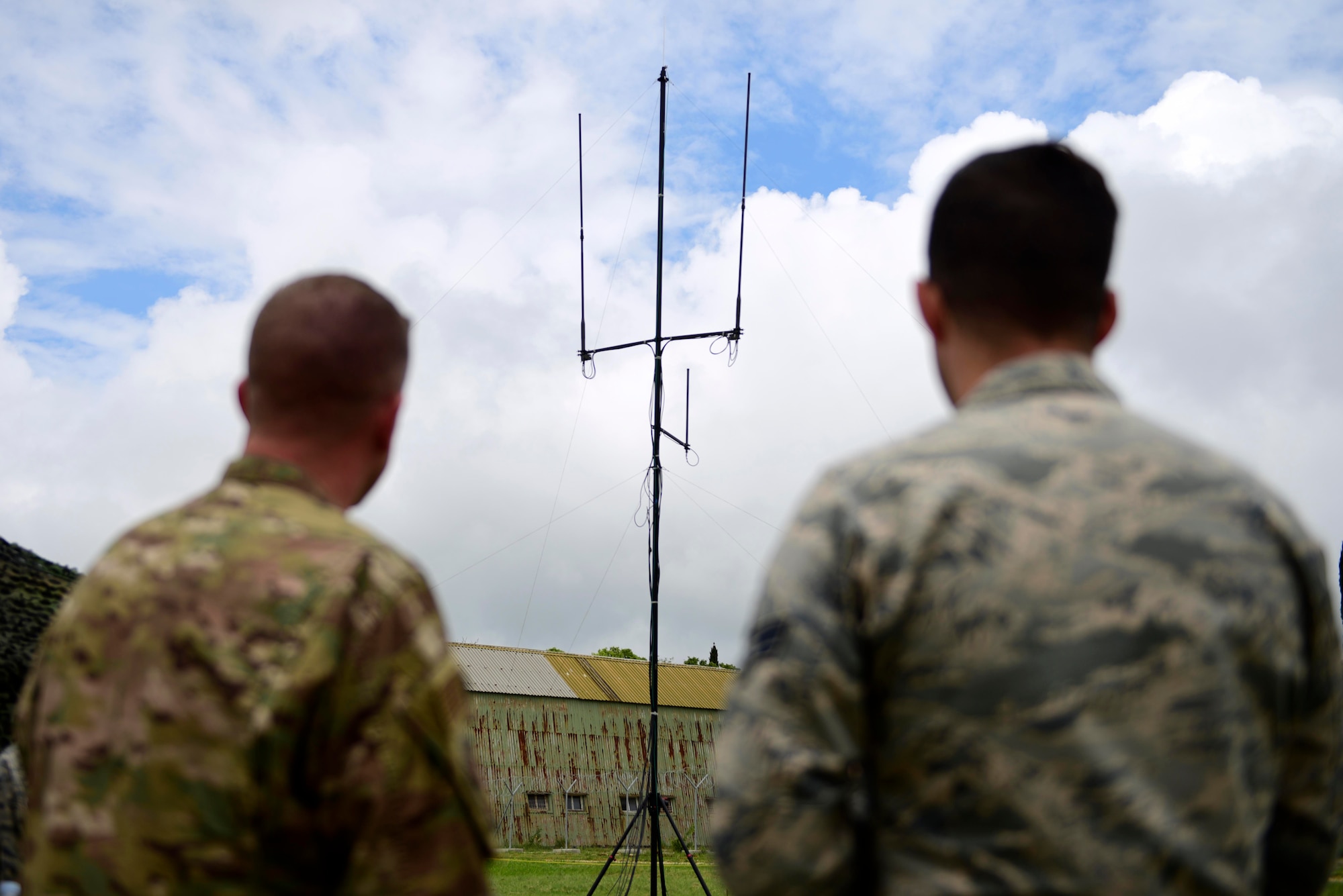SrA Judah Wine, 606th Air Control Squadron radio frequency systems technician, explains blue sky mast set up and operations to Lt. Col. Brian Robertson, 606th ACS commander, at Pula Airport, Croatia, May 28, 2019. The 606th ACS deployed in support of exercise Astral Knight 2019. (U.S. Air Force photo by Staff Sgt. Tory Cusimano)