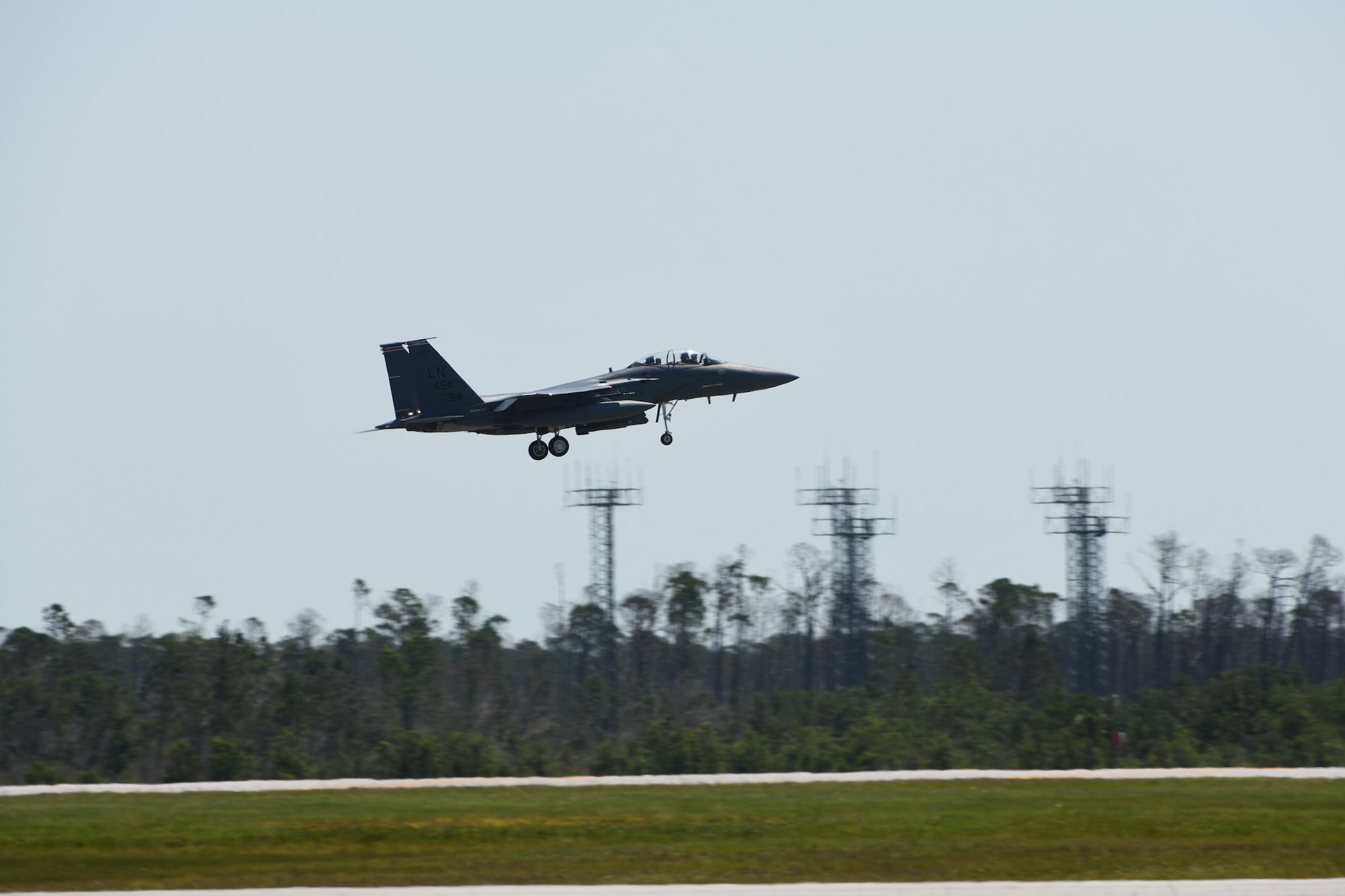 An F-15E Strike Eagle assigned to the 494th Fighter Squadron completes its final sortie during exercise Checkered Flag 19-1 at Tyndall Air Force Base, Florida, May 17, 2019.  Checkered Flag is a large-force exercise that allows fourth- and fifth-generation aircraft and personnel the opportunity to train together. (U.S. Air Force photo by Airman 1st Class Shanice Williams-Jones)