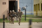 Members of the 4th Infantry Division run from one building to another at Selby Combined Arms Collective Training Facility on Fort Benning, Georgia, during the 36th Best Ranger Competition in April. Army installations have become more vulnerable, said Lt. Gen. Gwen Bingham, assistant chief of staff for installation management. In order to better protect Army posts worldwide, senior Army leaders said that the service will consider using smart technology to bolster security and enable commanders to respond to threats swiftly.